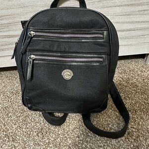 White Mountain Black Backpack with Silver Accents